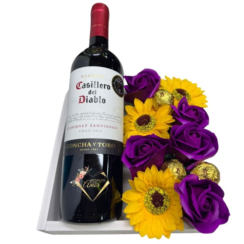 WhatsApp Image 2026-04-10 at 11.26.32 (1) Base con Vino, Bombones, Girasoles y Rosas Eternas Moradas - Imagen 1
