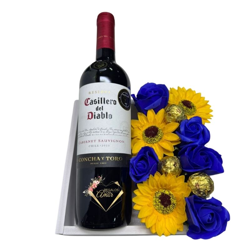 WhatsApp Image 2026-04-10 at 11.26.32 (6) Base con Vino, Bombones, Girasoles y Rosas Eternas Azules - Imagen 1